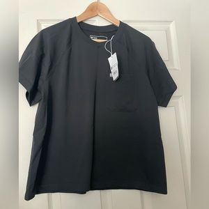 Figs under scrub shirt